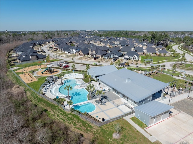 10066 Preserve Way, Conroe, TX 77385 - aerial perspective of suburban area featuring a pool area