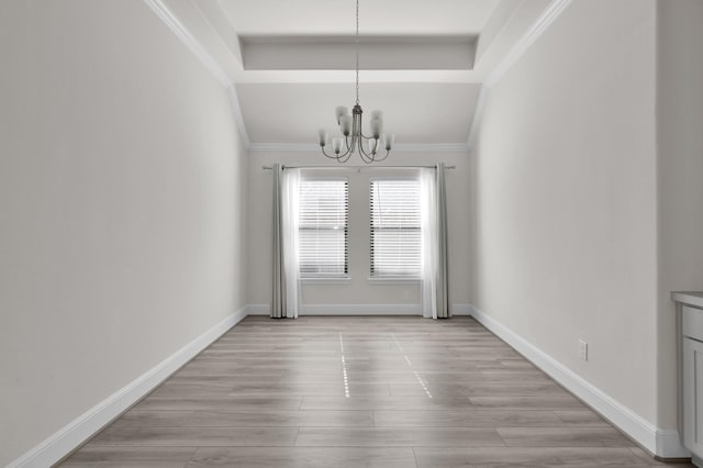 10066 Preserve Way, Conroe, TX 77385 - unfurnished dining area featuring a chandelier, ornamental molding, baseboards, light wood finished floors, and french doors