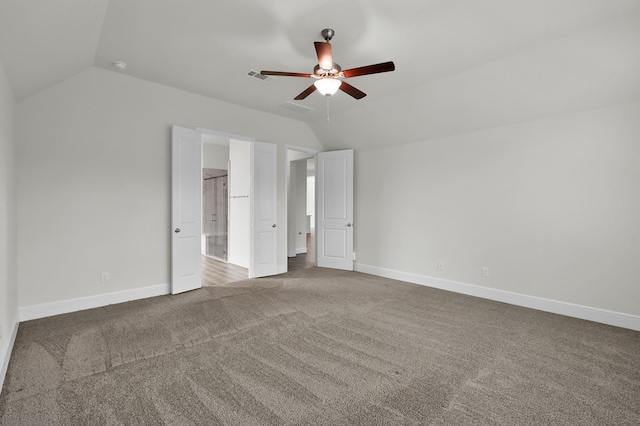 10066 Preserve Way, Conroe, TX 77385 - unfurnished bedroom with lofted ceiling, carpet flooring, baseboards, and ceiling fan