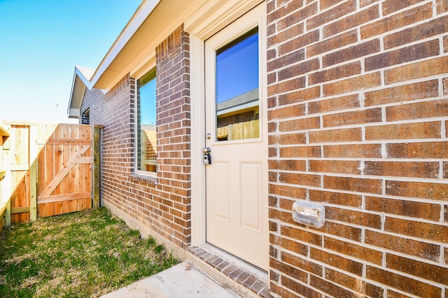 9315 Sierra Point Way, Baytown, TX 77521 - entrance to property with brick siding and a gate