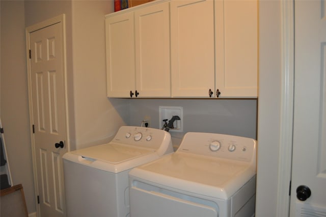 280 Lakewood Cir, Brenham, TX 77833 - clothes washing area featuring washing machine and dryer and cabinet space