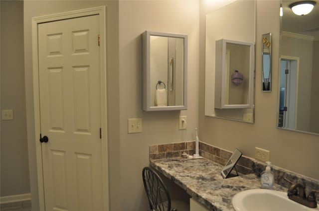 280 Lakewood Cir, Brenham, TX 77833 - bathroom with crown molding and vanity