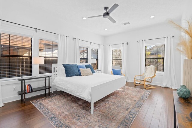 128 N Jenkins St, Houston, TX 77003 - bedroom featuring hardwood / wood-style floors, recessed lighting, ceiling fan, and baseboards