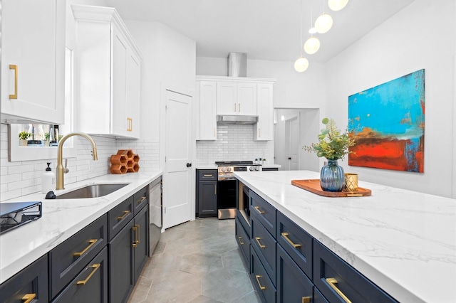 128 N Jenkins St, Houston, TX 77003 - kitchen with a sink, appliances with stainless steel finishes, white cabinetry, backsplash, and light stone countertops