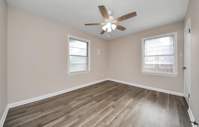 2013 15th Ave N, Texas City, TX 77590 - unfurnished room featuring wood finished floors, baseboards, and a ceiling fan