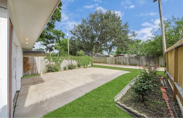 2013 15th Ave N, Texas City, TX 77590 - view of yard featuring a patio area