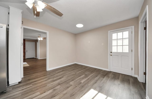 2013 15th Ave N, Texas City, TX 77590 - interior space with ceiling fan, wood finished floors, and baseboards