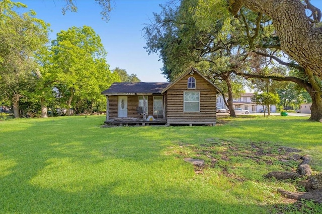 3929 Almeda Genoa Rd, Houston, TX 77047 - rear view of house featuring a yard