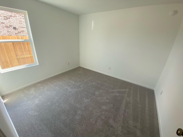 464 Shoreview Dr, Conroe, TX 77303 - carpeted spare room with baseboards