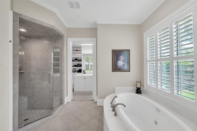 bathroom featuring healthy amount of natural light, a shower stall, a bath, a spacious closet, and crown molding