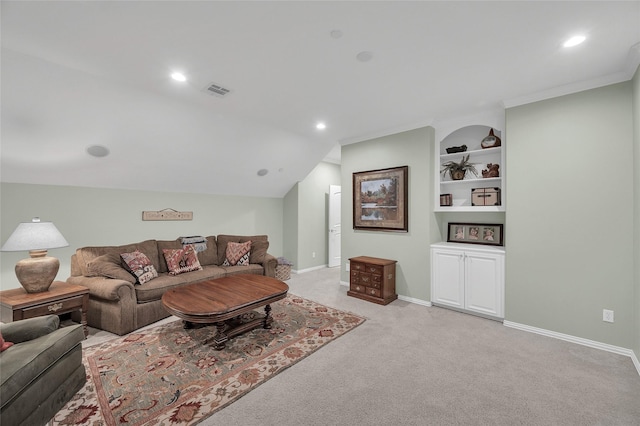 living area featuring light colored carpet, built in shelves, baseboards, and recessed lighting