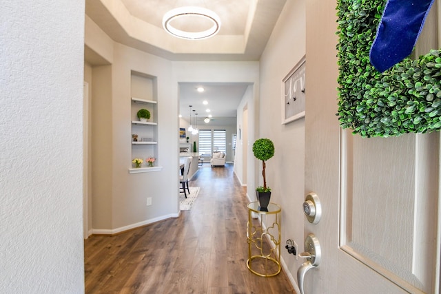 14923 Cutleaf Ln, Cypress, TX 77429 - corridor featuring wood finished floors and built in shelves