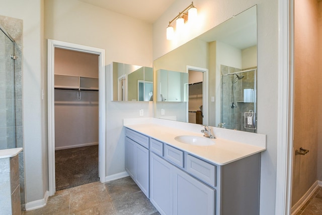 14923 Cutleaf Ln, Cypress, TX 77429 - full bathroom with a walk in closet, vanity, and a shower stall