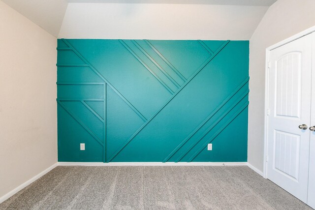 14923 Cutleaf Ln, Cypress, TX 77429 - empty room featuring vaulted ceiling and carpet flooring