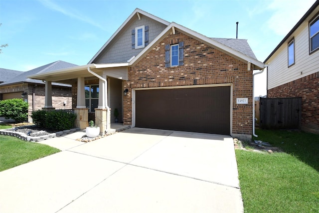 14923 Cutleaf Ln, Cypress, TX 77429 - view of front facade with brick siding and driveway