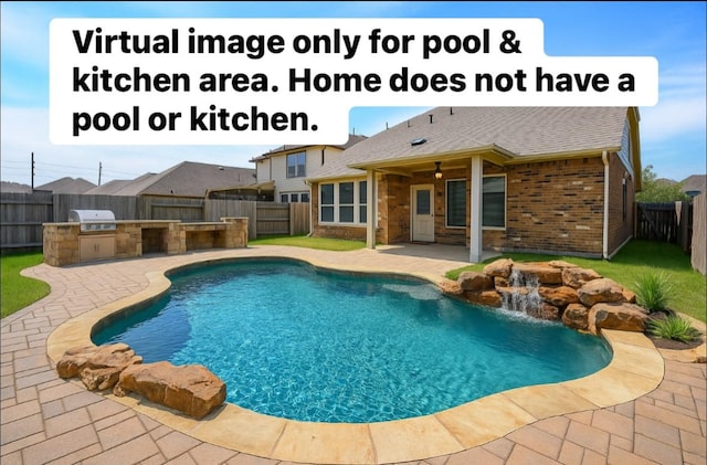 14923 Cutleaf Ln, Cypress, TX 77429 - view of swimming pool with an outdoor kitchen, a fenced backyard, and a patio area