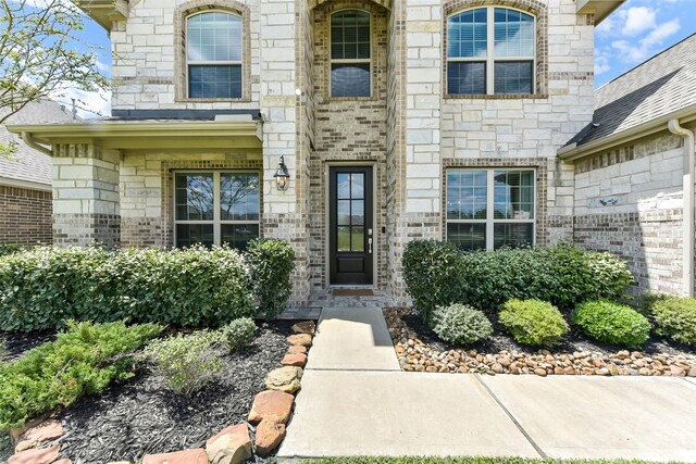 19115 Blooms Rise Dr, Tomball, TX 77377 - doorway to property with stone siding and brick siding