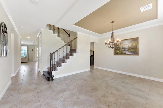 19115 Blooms Rise Dr, Tomball, TX 77377 - entrance foyer featuring arched walkways, crown molding, a chandelier, stairway, and light tile patterned floors