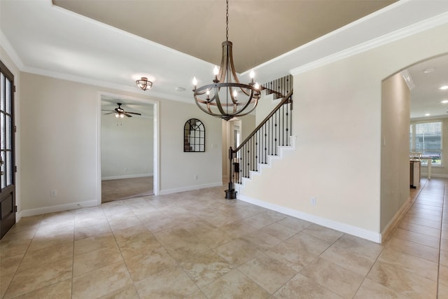 19115 Blooms Rise Dr, Tomball, TX 77377 - entryway featuring arched walkways, ceiling fan, crown molding, a chandelier, and light tile patterned floors