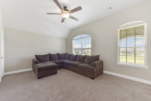 19115 Blooms Rise Dr, Tomball, TX 77377 - living room featuring light colored carpet, a ceiling fan, baseboards, and lofted ceiling