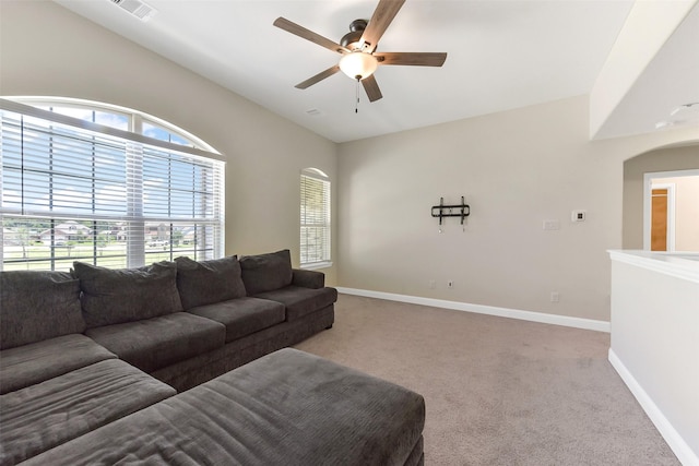 19115 Blooms Rise Dr, Tomball, TX 77377 - living room with healthy amount of natural light, ceiling fan, carpet floors, and baseboards
