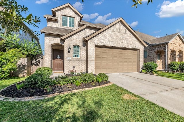 12311 Summerbrook Dr, Houston, TX 77066 - french provincial home with driveway, a garage, brick siding, and a front yard
