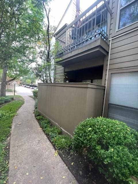 10049 Westpark Dr Unit 113, Houston, TX 77042 - view of home's exterior with a balcony