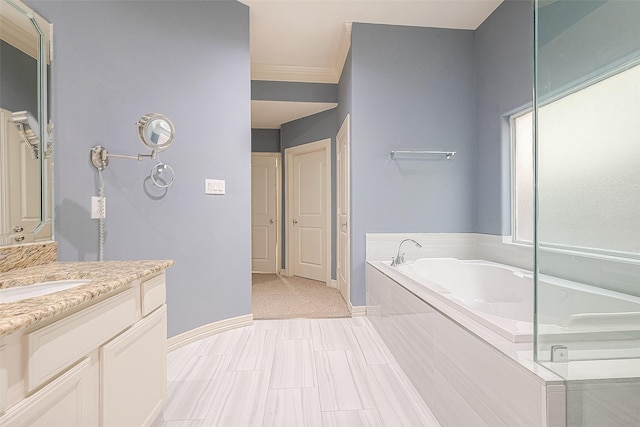6014 Hamman St, Houston, TX 77007 - full bath with a garden tub, vanity, baseboards, and ornamental molding