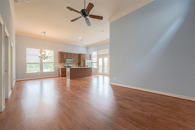 6014 Hamman St, Houston, TX 77007 - unfurnished living room with a chandelier, crown molding, baseboards, ceiling fan, and wood finished floors