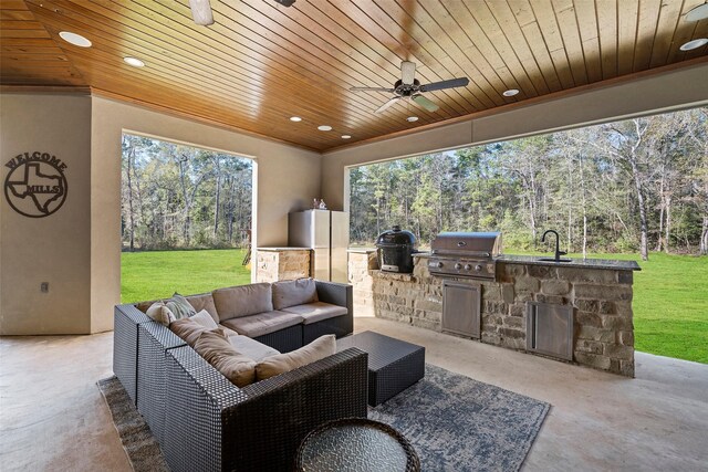 11410 Sunset Ave, Magnolia, TX 77354 - view of patio featuring an outdoor hangout area, a sink, a ceiling fan, and view of scattered trees