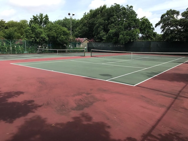10047 Westpark Dr Unit 46, Houston, TX 77042 - view of tennis court featuring community basketball court