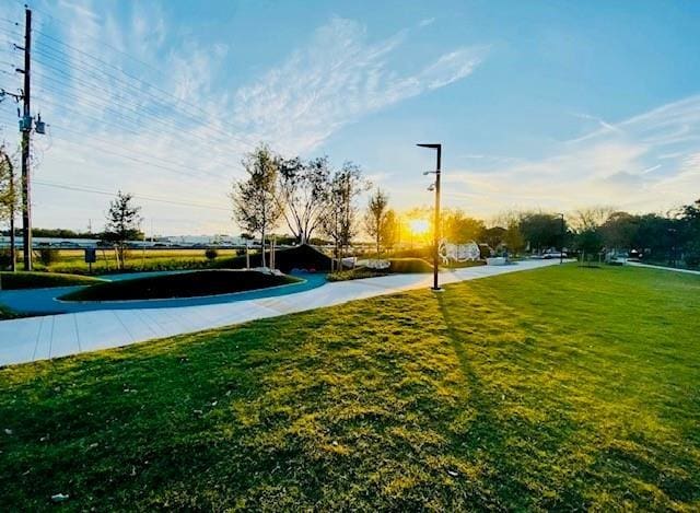 10047 Westpark Dr Unit 46, Houston, TX 77042 - view of home's community featuring a yard