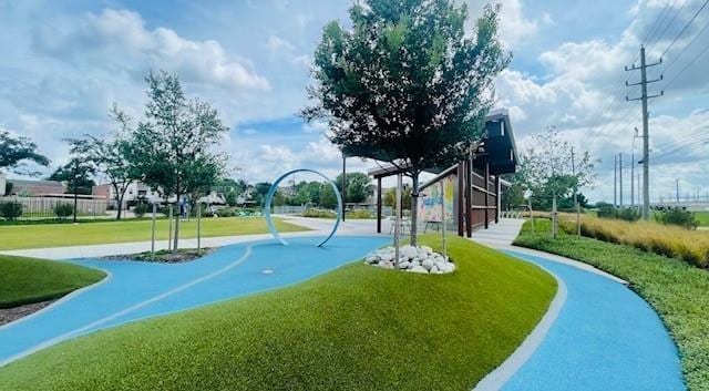 10047 Westpark Dr Unit 46, Houston, TX 77042 - view of home's community featuring a lawn