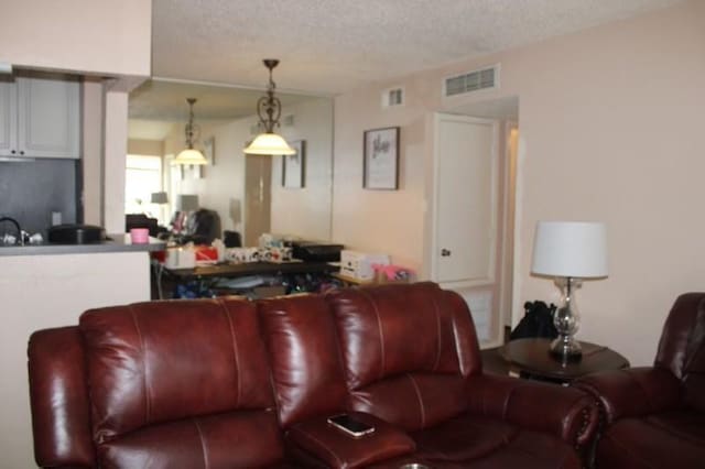 10047 Westpark Dr Unit 46, Houston, TX 77042 - living area with a textured ceiling