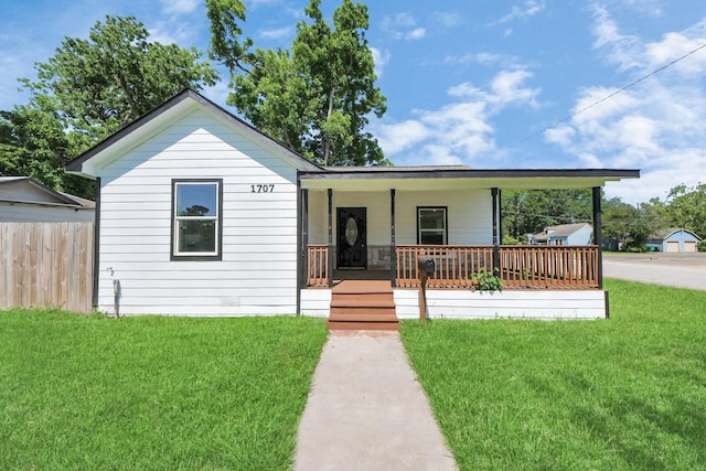 1707 Wilburn, Baytown, TX 77520 - view of front of property featuring a porch