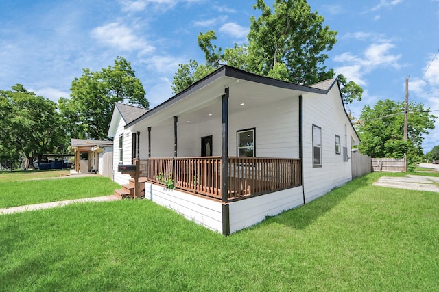 1707 Wilburn, Baytown, TX 77520 - view of front facade featuring a front yard