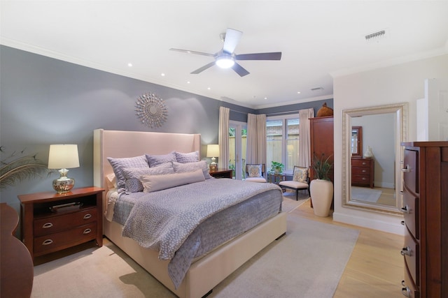 513 Rancho Bauer Dr, Houston, TX 77079 - bedroom with crown molding, light wood-type flooring, recessed lighting, and ceiling fan