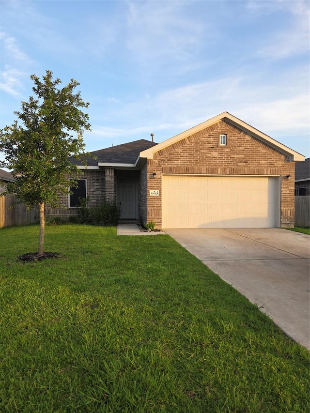 10010 Pine Valley Ct, Baytown, TX 77521 - ranch-style home with brick siding, a garage, and driveway