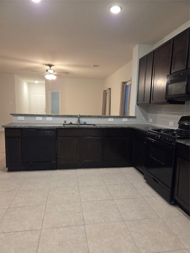 10010 Pine Valley Ct, Baytown, TX 77521 - kitchen featuring black appliances, stone countertops, tasteful backsplash, a ceiling fan, and recessed lighting