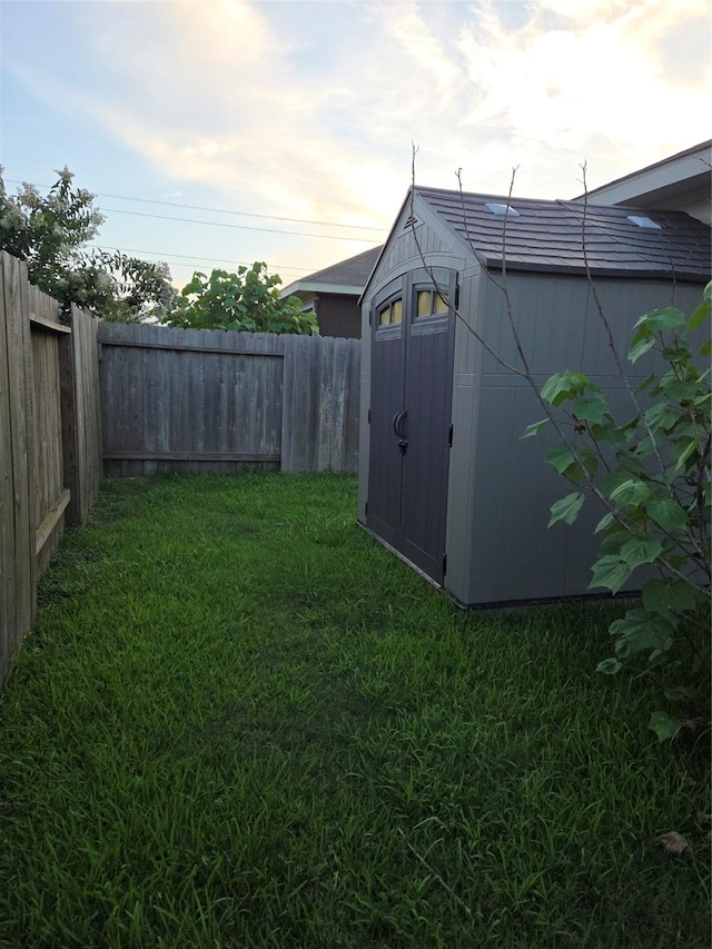 10010 Pine Valley Ct, Baytown, TX 77521 - fenced backyard with a shed