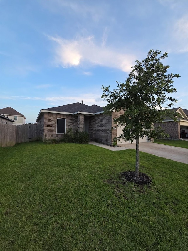 10010 Pine Valley Ct, Baytown, TX 77521 - view of front of home featuring concrete driveway, brick siding, and a garage
