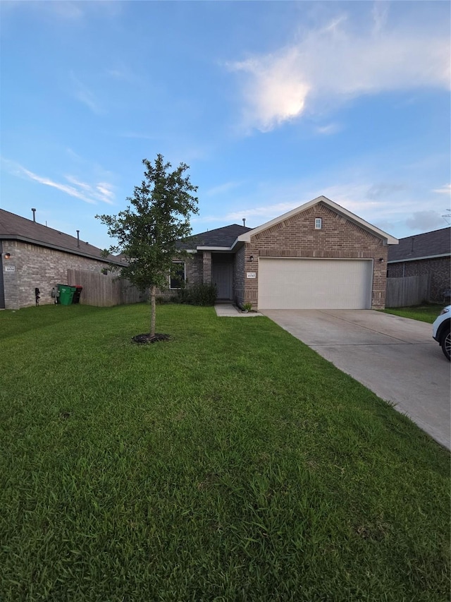 10010 Pine Valley Ct, Baytown, TX 77521 - single story home with a garage, brick siding, and concrete driveway