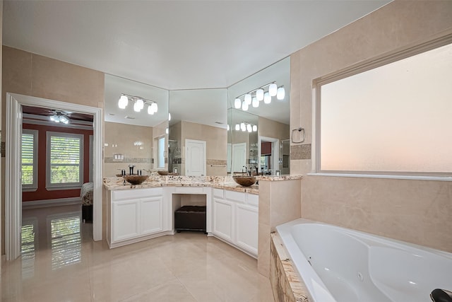 5411 Oban Terrace Ln, Sugar Land, TX 77479 - bathroom featuring tile patterned floors, a jetted tub, vanity, and walk in shower