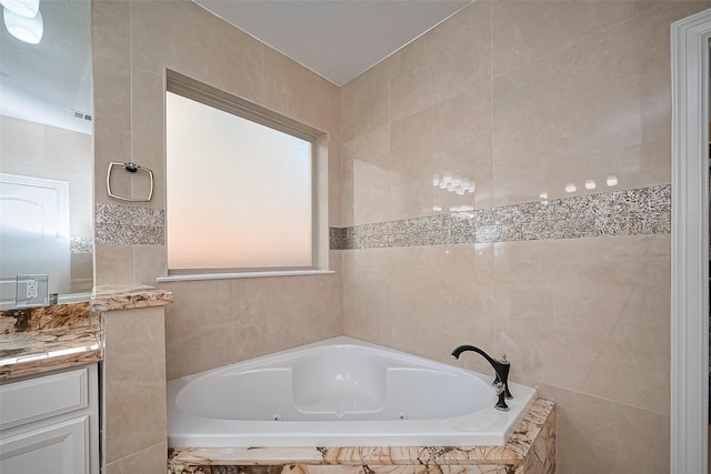 5411 Oban Terrace Ln, Sugar Land, TX 77479 - full bath with tile walls, a tub with jets, and vanity