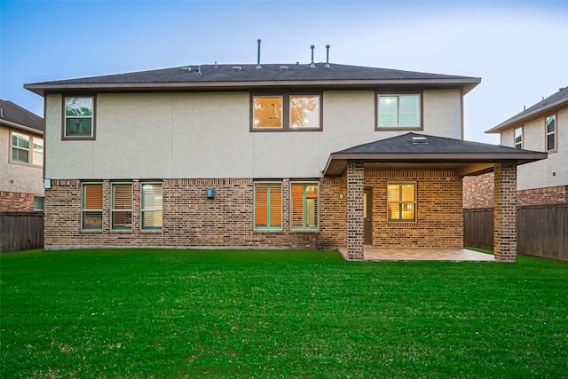 5411 Oban Terrace Ln, Sugar Land, TX 77479 - rear view of property with a patio, stucco siding, and brick siding
