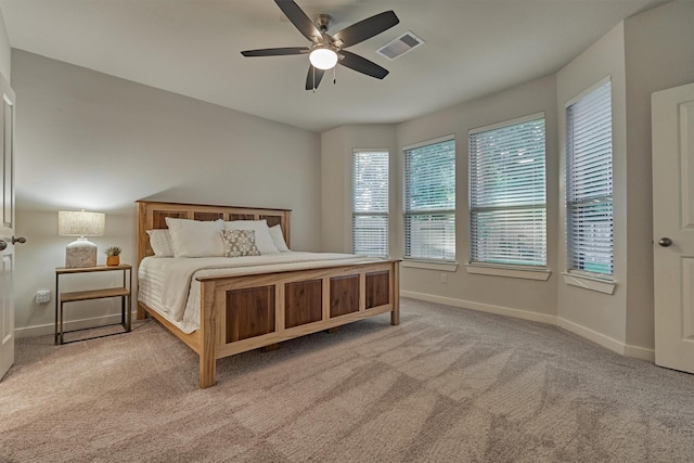 106 Emory Birch Dr, Montgomery, TX 77316 - carpeted bedroom featuring baseboards and a ceiling fan