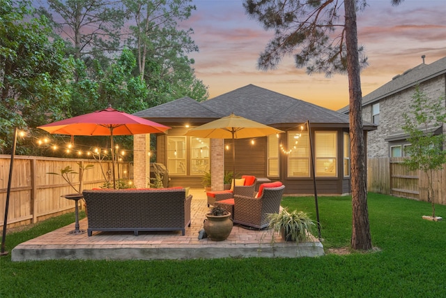 106 Emory Birch Dr, Montgomery, TX 77316 - back of house featuring roof with shingles, an outdoor living space, and a patio