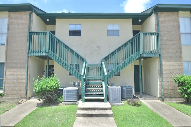 1516 Bay Area Blvd Unit C6, Houston, TX 77058 - view of property with stairs and central AC unit