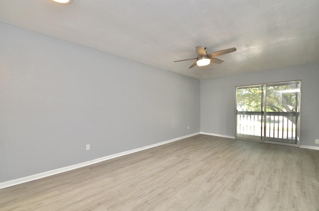 1516 Bay Area Blvd Unit C6, Houston, TX 77058 - empty room with a ceiling fan, wood finished floors, and baseboards