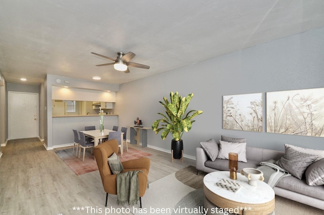 1516 Bay Area Blvd Unit C6, Houston, TX 77058 - living room with ceiling fan, wood finished floors, baseboards, and recessed lighting